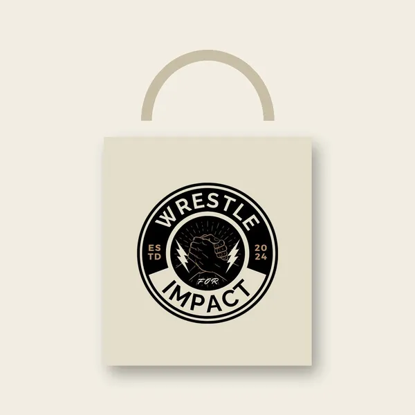 Cream canvas tote bag printed with the Wrestle for Impact logo