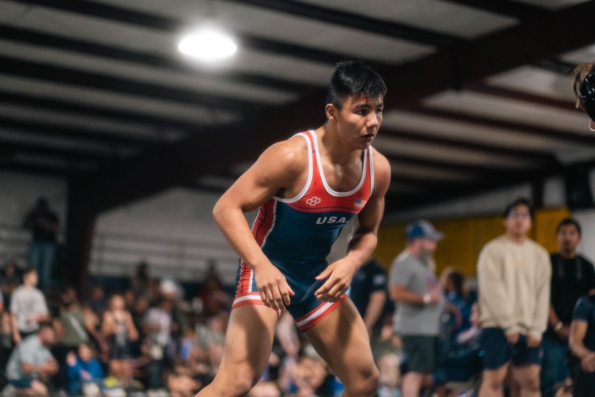 A Texas wrestler in his stance during a match